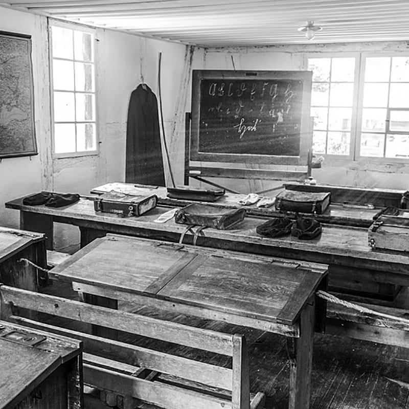 An old style classroom show in black and white